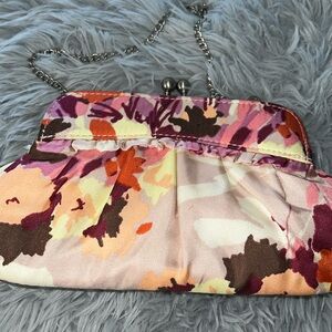 Gap blush floral evening bag. Never used just stores but rating GUC to be safe.